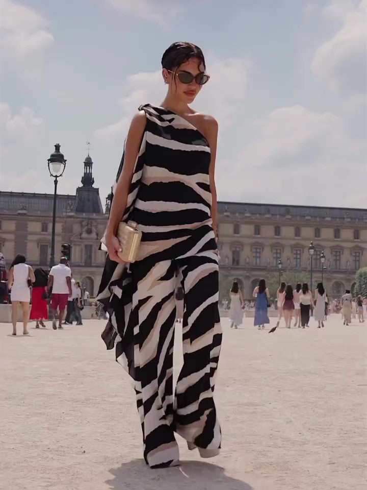 Look sofisticado animal print de corte asimétrico