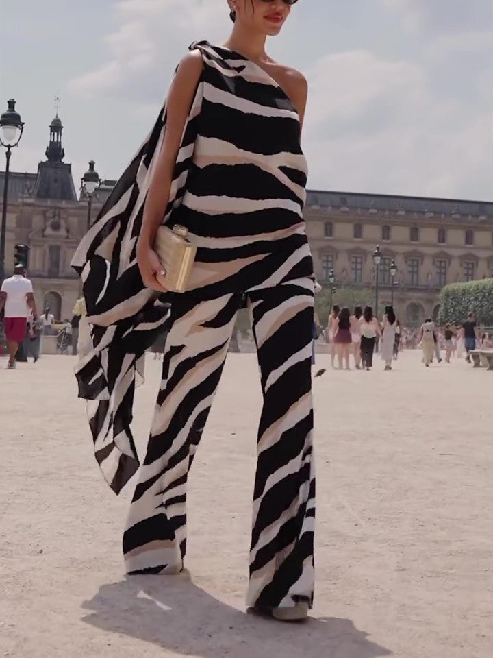 Look sofisticado animal print de corte asimétrico